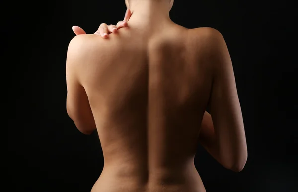 View on woman\'s nude back, close-up