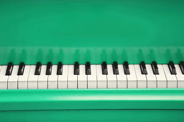 Piano keys of green piano