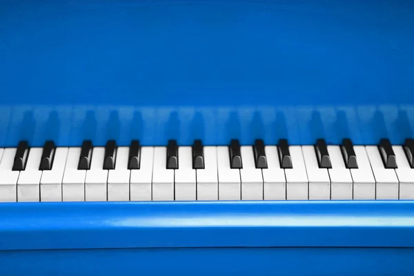 Piano keys of blue piano