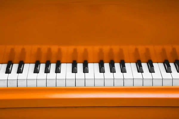 Piano keys of orange piano