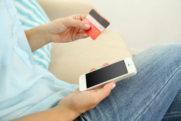 Female using mobile banking