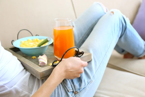 Girl with tray having lunch