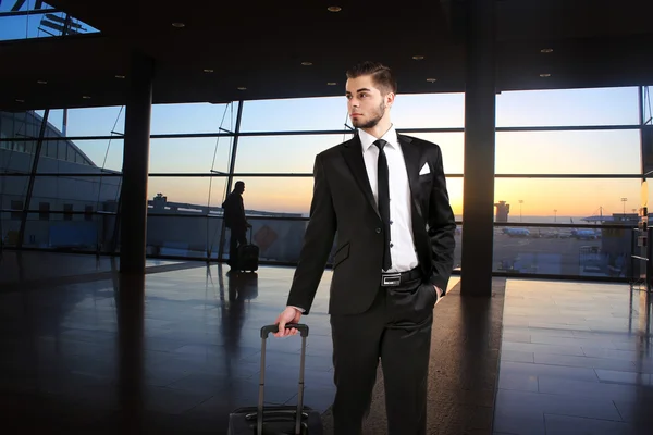 Business man in hall of airport