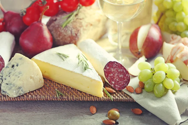 Still life with various types of Italian food and wine