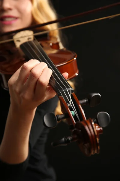 Musician plays violin