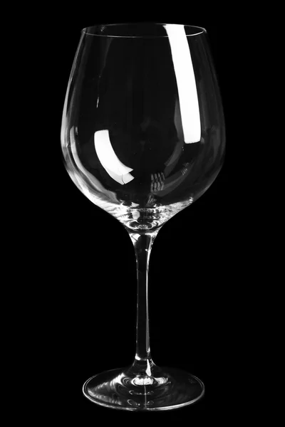 Empty glass on black background