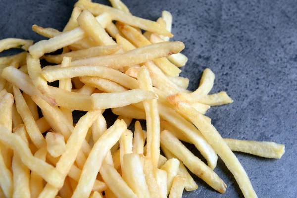 French fries on table, close-up