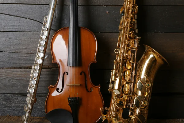 Musical instruments: saxophone, violin and flute