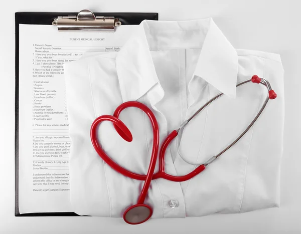 Stethoscope, medical record and uniform
