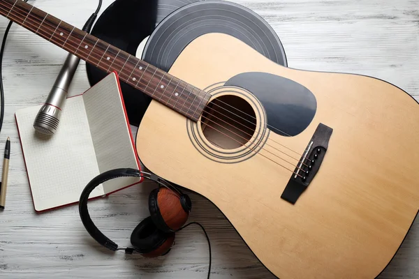 Close up view on musical equipment against grey wooden background