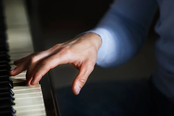Close up of musician hand piano playing