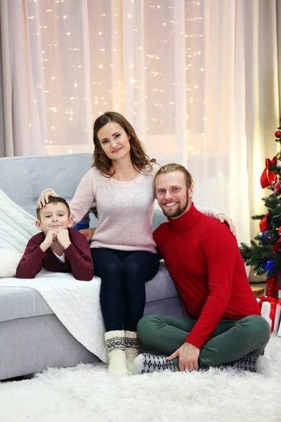 Christmas family in holiday living room