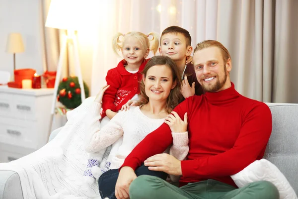 Christmas family in holiday living room