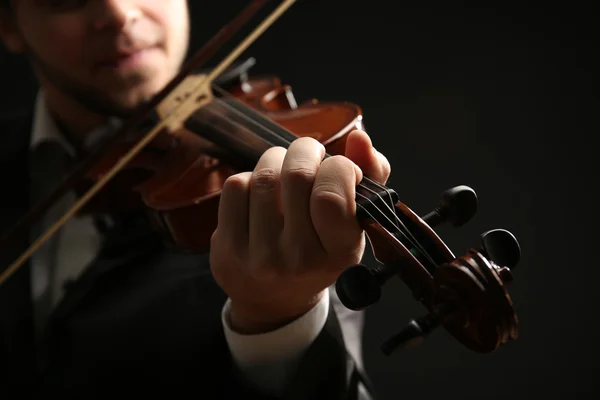 Musician plays violin