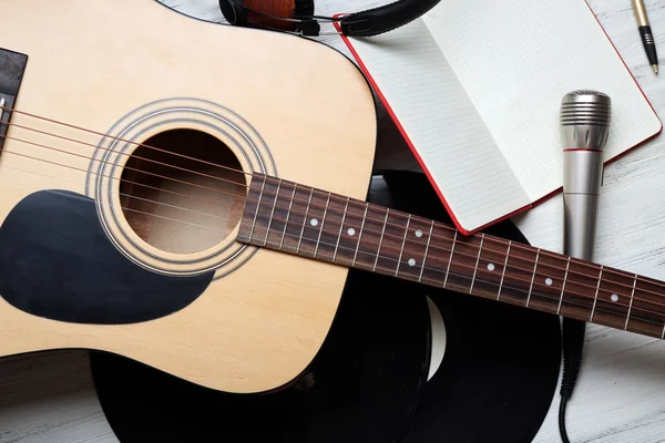 Close up view on musical equipment against grey wooden background