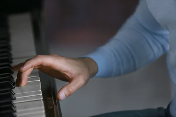 Musician hand piano playing