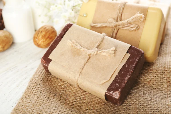 Soap set on a cloth background, close up