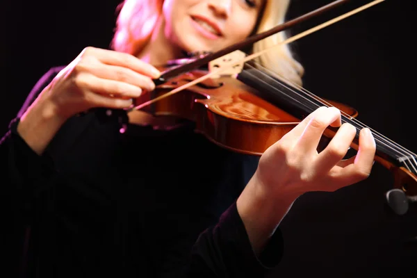 Woman plays violin