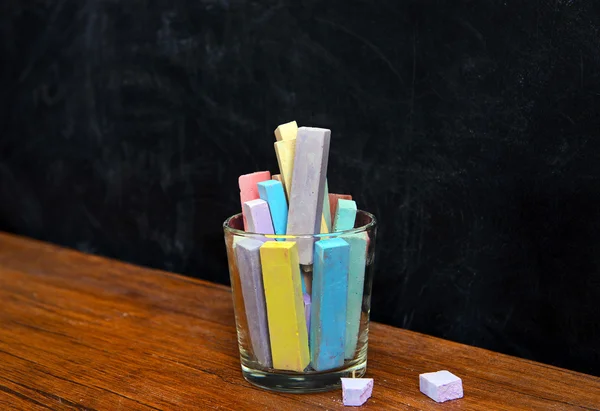 Glass of coloured chalk