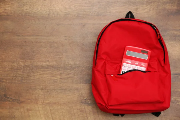 Red Backpack and calculator