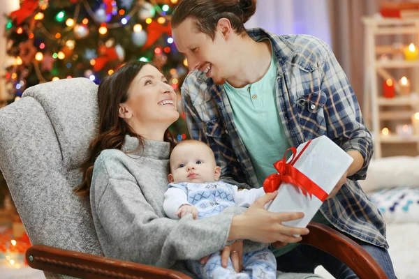 Happy family in decorated room