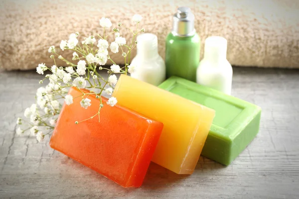 Soap set on a wooden background