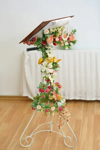 Wedding desk decorated with flowers