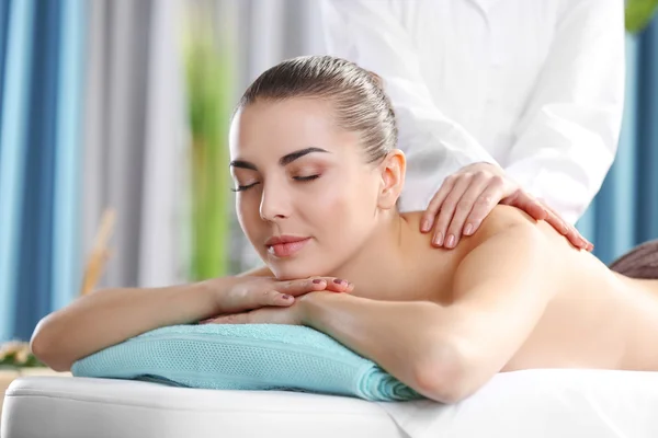 Woman relaxing with hand massage