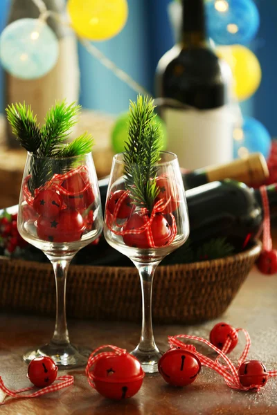 Wine in wicker bowl and Christmas decor
