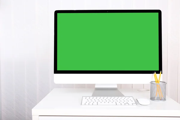 Modern computer with green screen