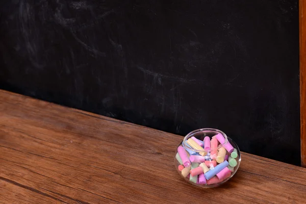 Glass jar with coloured chalk