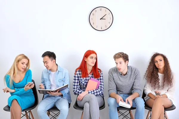 People sitting on chairs