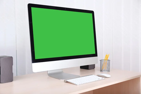 Modern computer with green screen
