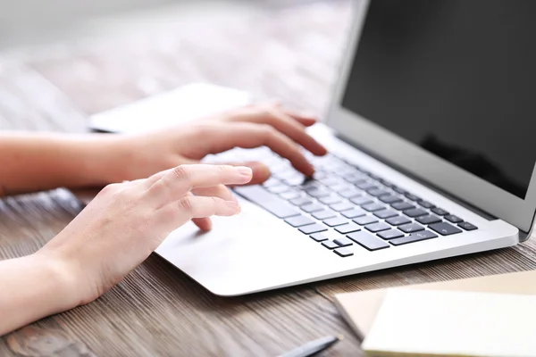 Woman  working with laptop