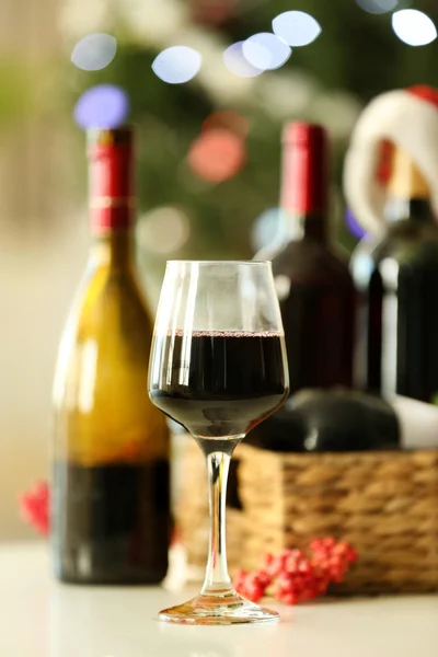 Wine in wicker box and Christmas decor