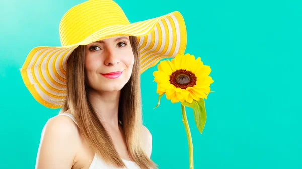 Portrait attractive woman with sunflower
