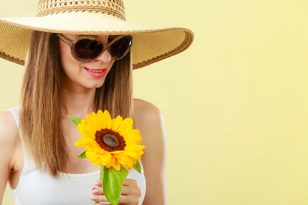 Portrait attractive woman with sunflower