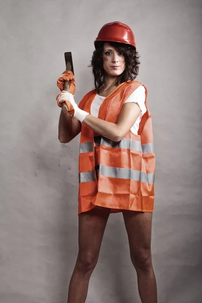 Girl  holding hammer tool