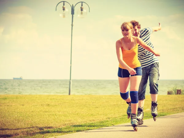 Young couple on roller skates