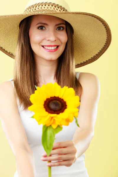 Portrait attractive woman with sunflower