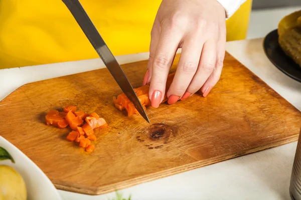 Chef woman cuts