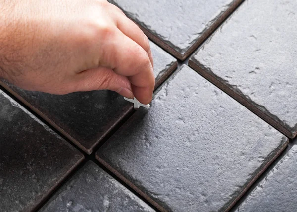 Laying of ceramic tiles