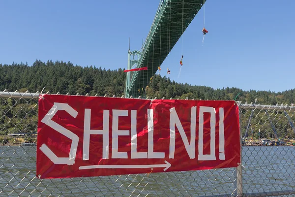 Greenpeace Activists Dangling Over St Johns Bridge with Sign