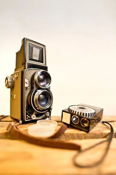 Old twin-lens reflex camera with light meter