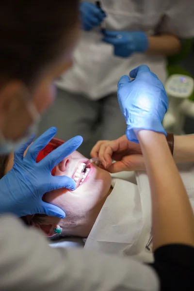 Patient in dentist office.