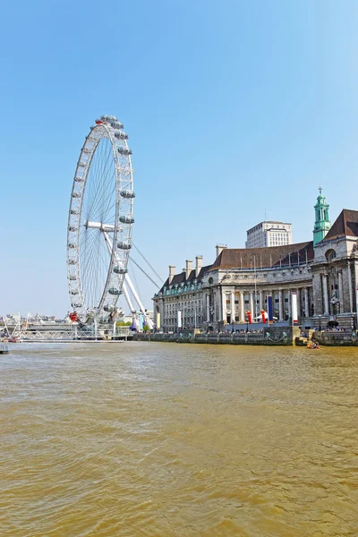 London Eye and County Hall on River Thames in London