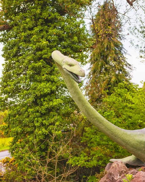 Loch ness monster statue in Loch Ness in Scotland