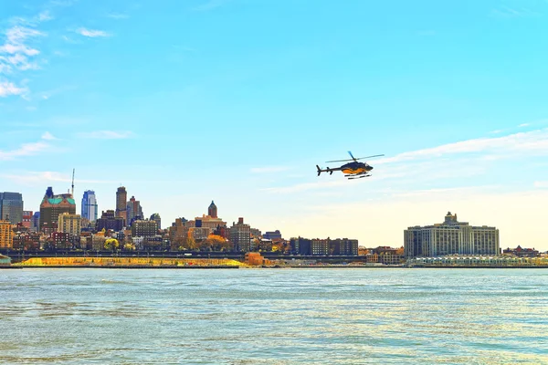 Helicopter flying above East River