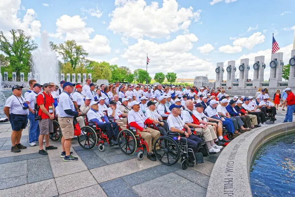Group of Veterans near Pillars on National World War Memorial