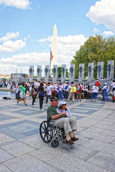 Veterans near Pillars on National World War Memorial